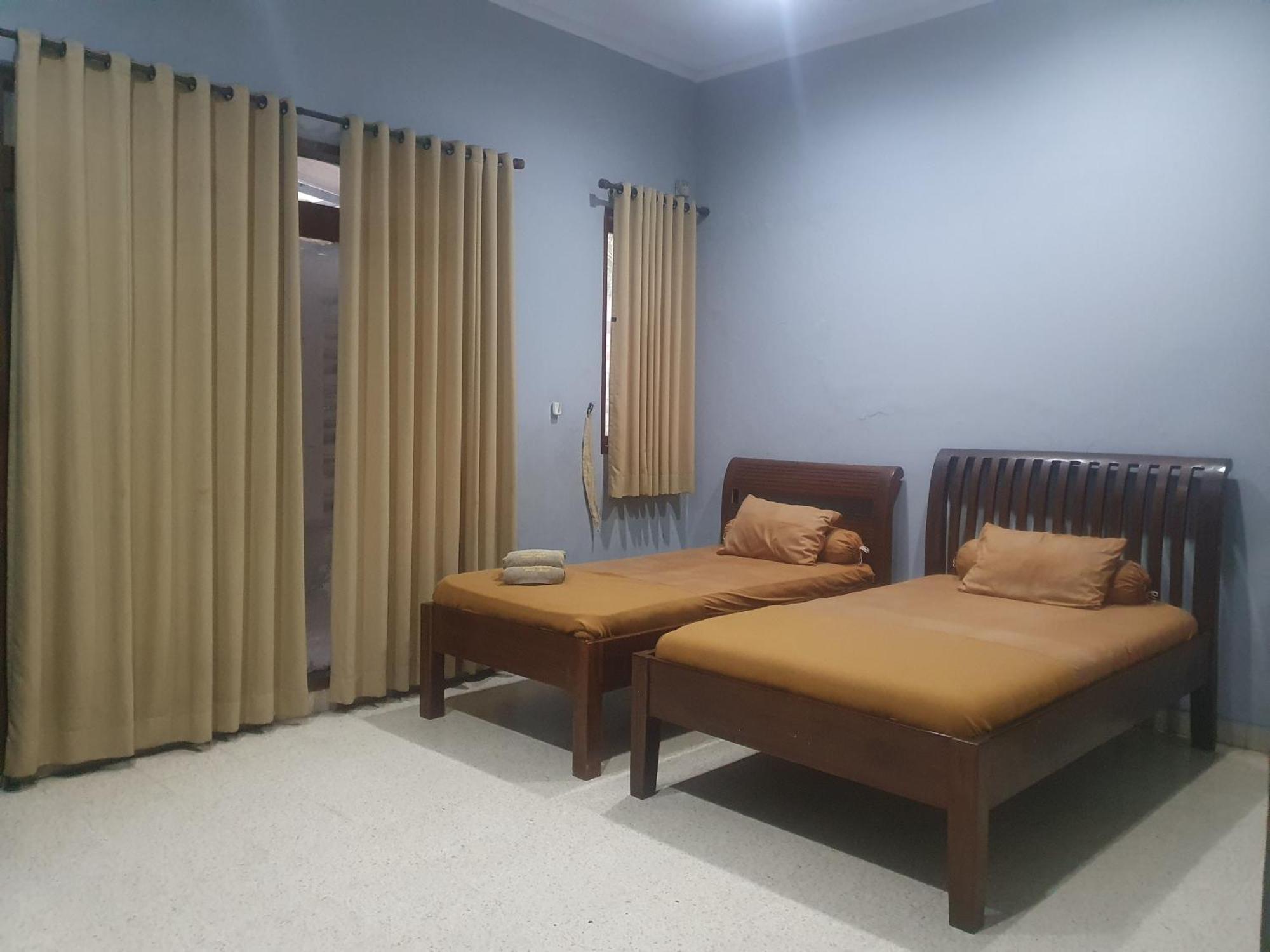 Ruang Tidur At Dpalma Bogor Hotel Exterior foto