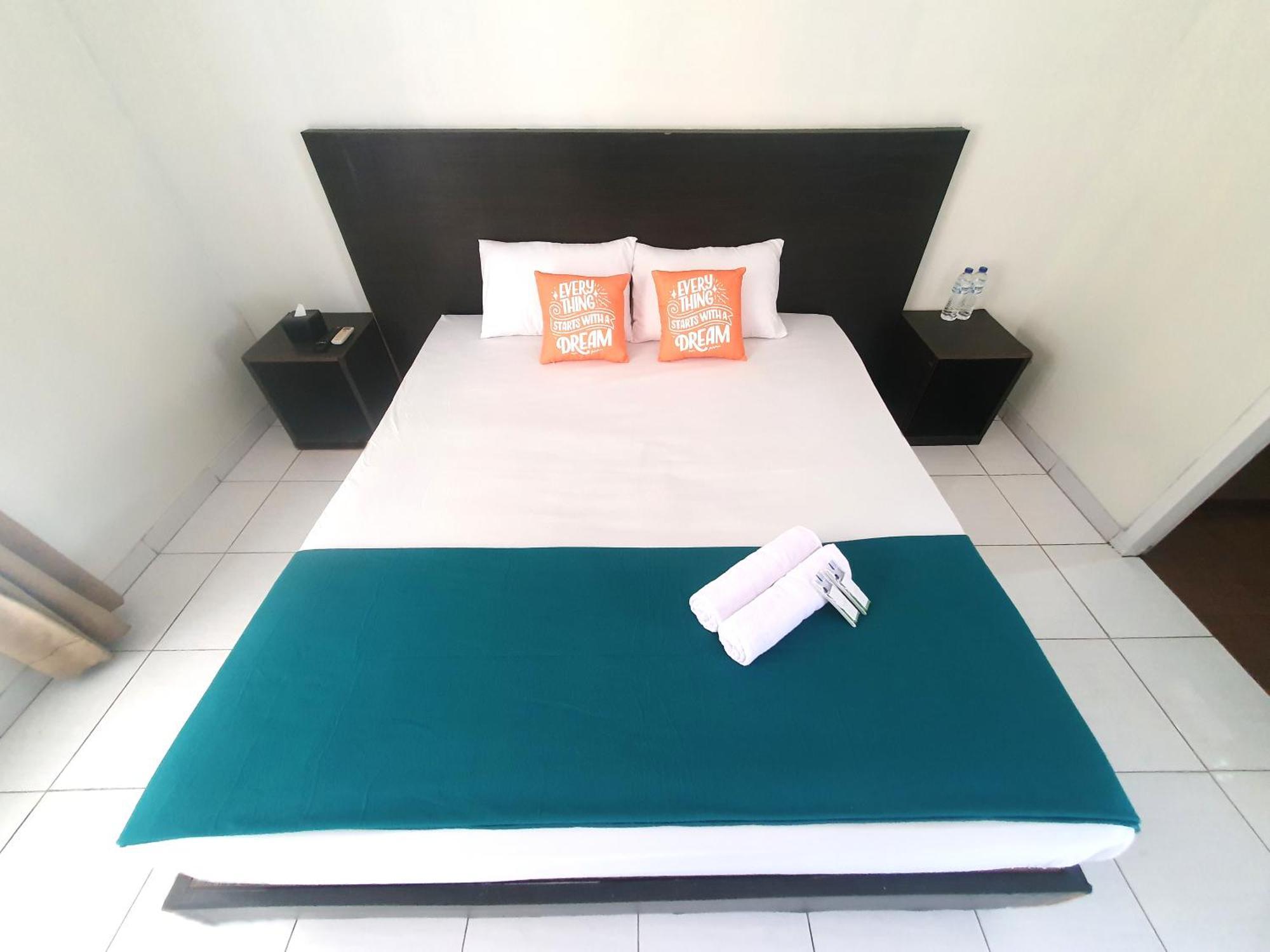 Ruang Tidur At Dpalma Bogor Hotel Exterior foto